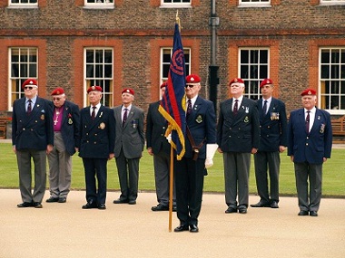 A picture of the veterans stood to attention